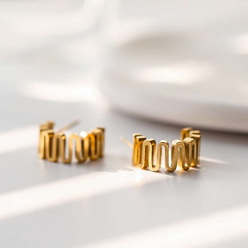 Gold Wavy Studs Earrings
