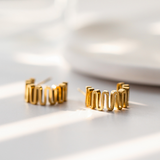 Load image into Gallery viewer, Gold Wavy Studs Earrings