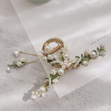 Load image into Gallery viewer, Floral Beaded Metal Claw Clip with Tassel