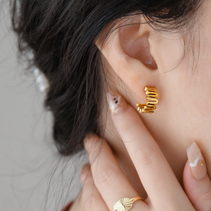 Gold Wavy Studs Earrings